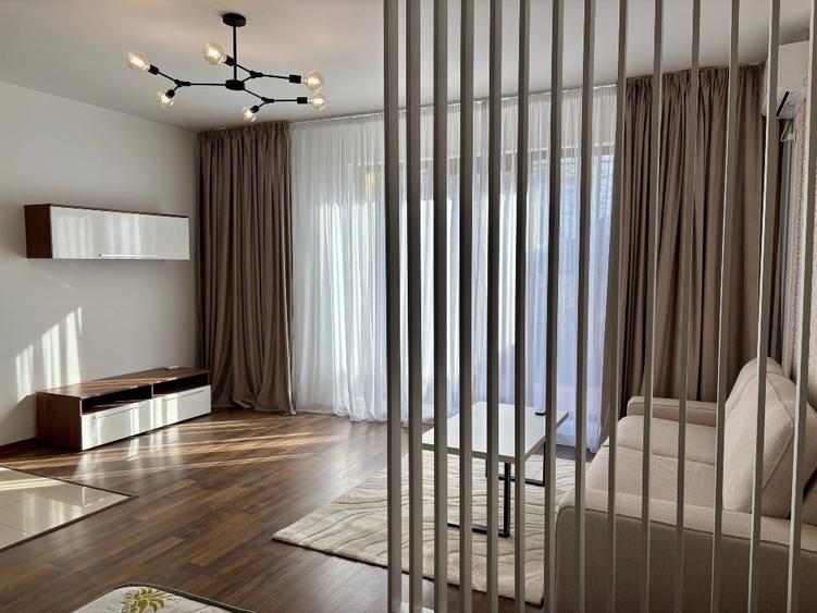PROPRIETAR Vand Garsoniera  cu terasa + gradina 92MP!!! +  loc parcare inclus - 1