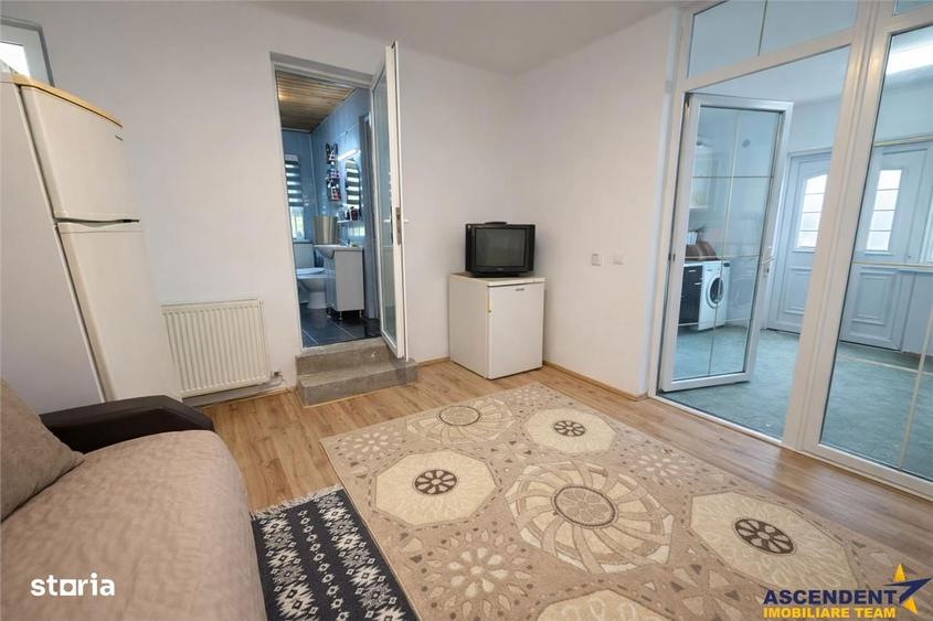 Casa cu 650 mp teren,zona linistita,curte verde,potential extindere,Gh - 2