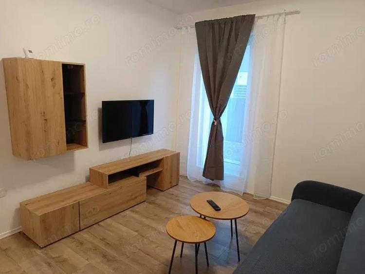 Inchiriez ap.decomandat 1 camera in Zona Buziasului, parter, suprafata utila de 45 mp. - 3