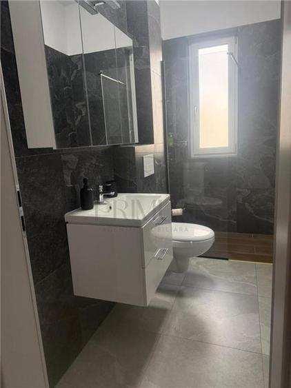 GIROC - 2 CAMERE - ETAJUL 1 - DECOMANDAT - MOBILAT SI UTILAT - PARCARE INCLUSA - 8