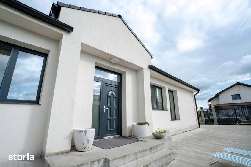 Casă cu 4 camere cu Teren 487 Mp în Sânmartin