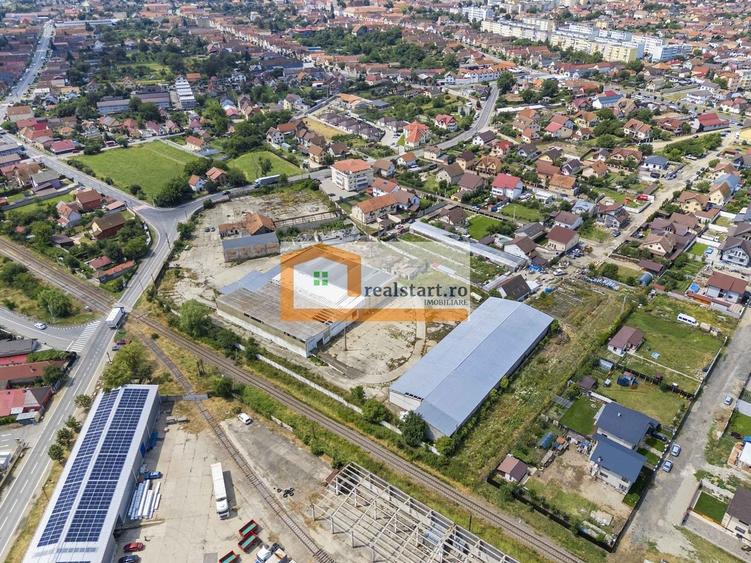 Codlea, depozite si teren 1,7 ha, 5600 mp cladiri, D 155 ml la DJ112A, acces E60 - 5