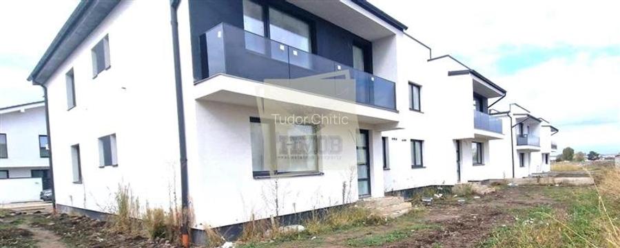 Casa la alb 2 bai 2 balcoane si curte 170 mp in Sibiu