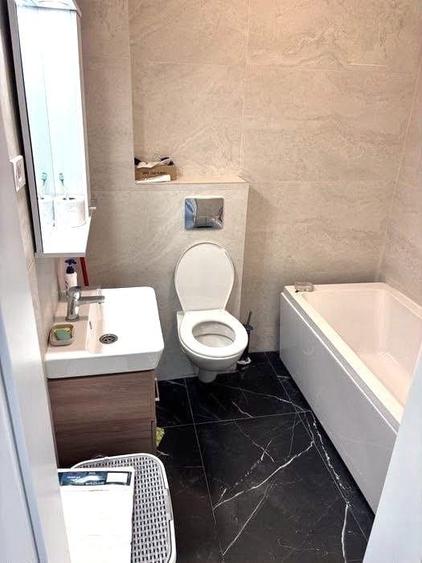 Apartament cu 3 camere decomandat, mobilat în Ozana