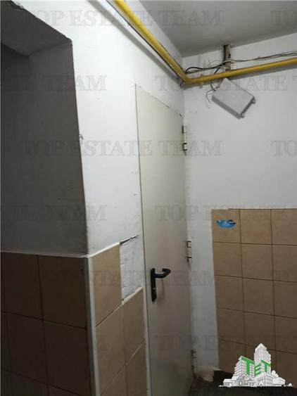 Apartament frumos cu doua camere la parter plus boxa intr-un bloc reabilitat din - 11