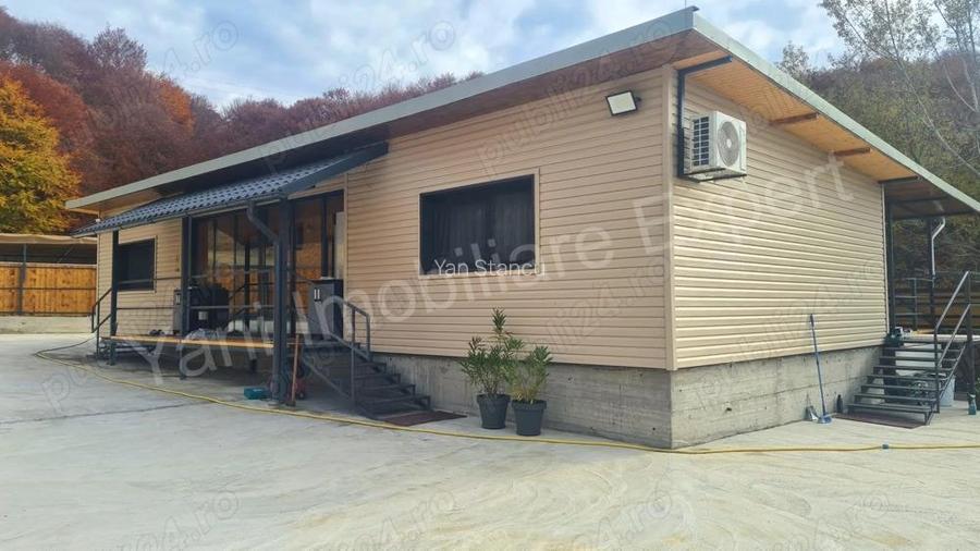 Casa de vanzare in Curtea de Arge?, priveli?te deosebita.