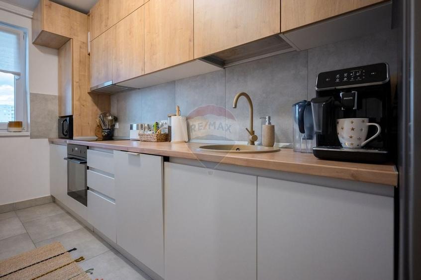 Apartament cu 2 camere,  2 băi și parcare subterană în Tractorul - 18