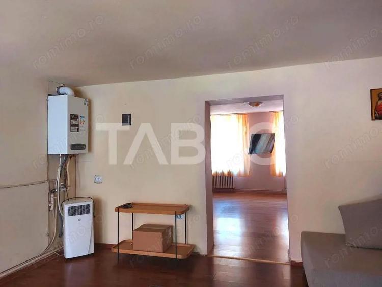 Casa 214 mp utili singur in curte 800 mp teren zona centrala Cisnadie - 3