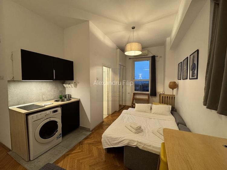 Garsoniera cu terasa de vanzare in *Piata Unirii*