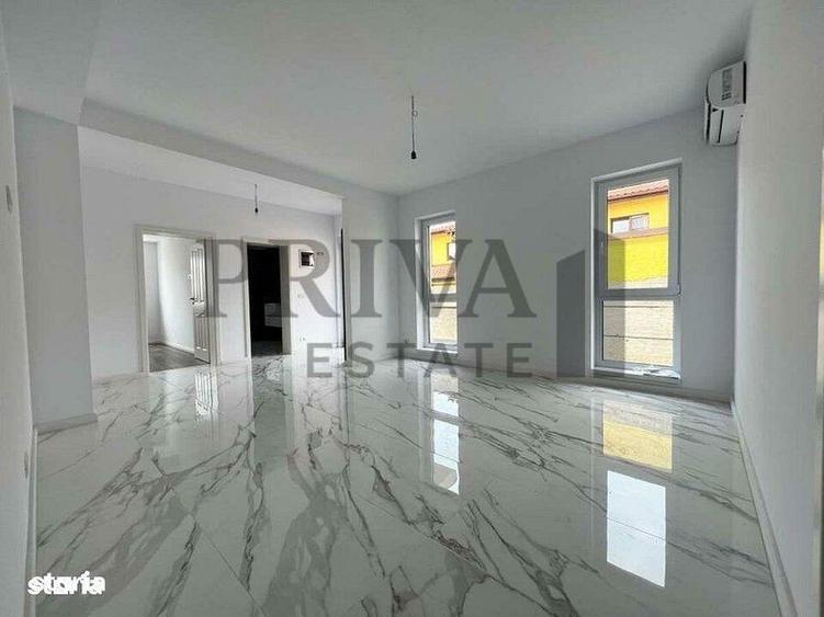 1/2 Duplex 124 mp utili + 330 curte. Dormitor parter,Bucatarie inchisa - 3