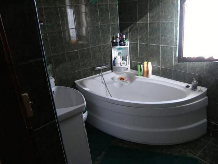 Casă cu 4 camere în Asău