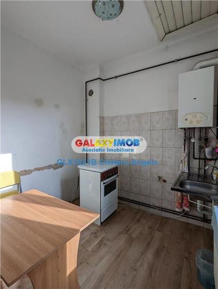 Timpuri Noi ,Suprafata Utila  175mp , doua garsoniere si un apartament - 6