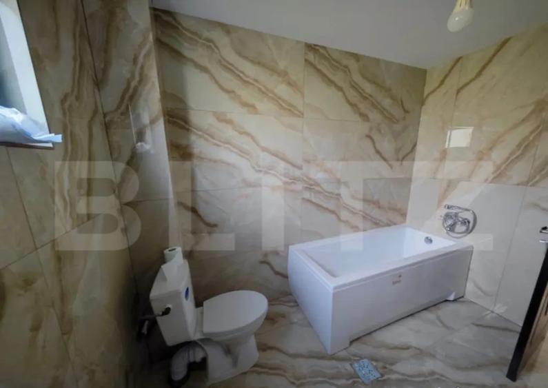 Casa cu 4 camere, 105 mp utili, cu garaj si 500 mp teren, zo - 4