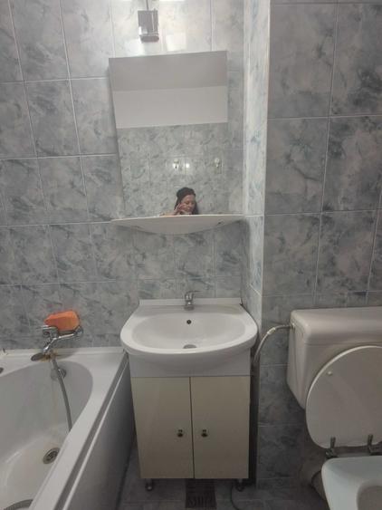 Garsonieră decomandată în Titan