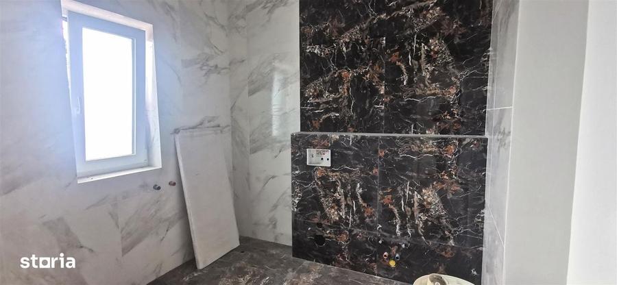 Casă cu 4 camere în Bucium