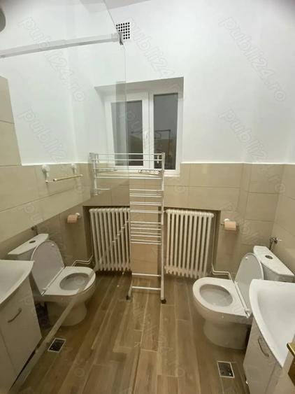 Apartament cu 3 camere nedecomandat, mobilat în Gara de Nord