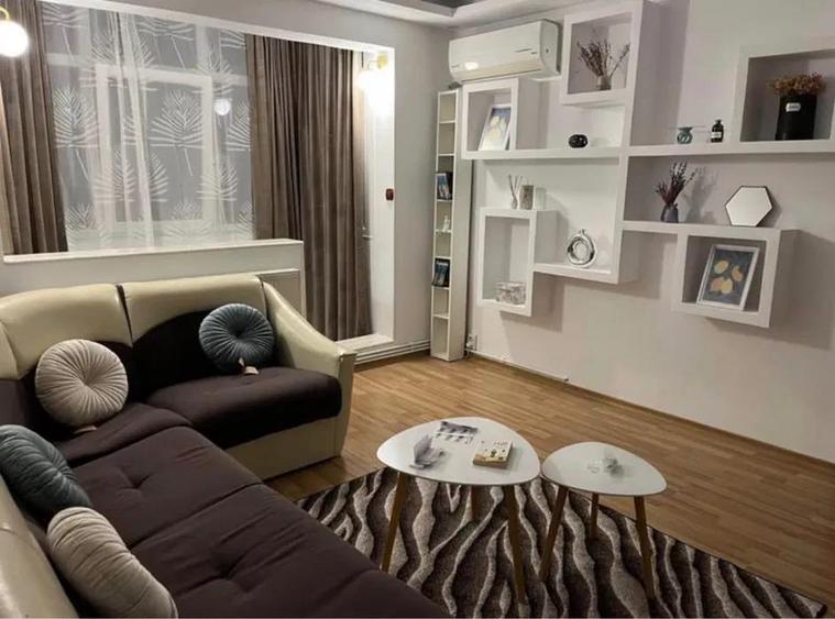 Apartament cu 2 camere semidecomandat, mobilat în Podu Roș