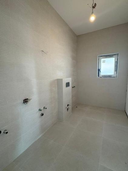 Casă individuală cu 4 camere cu Teren 400 Mp în Tunari