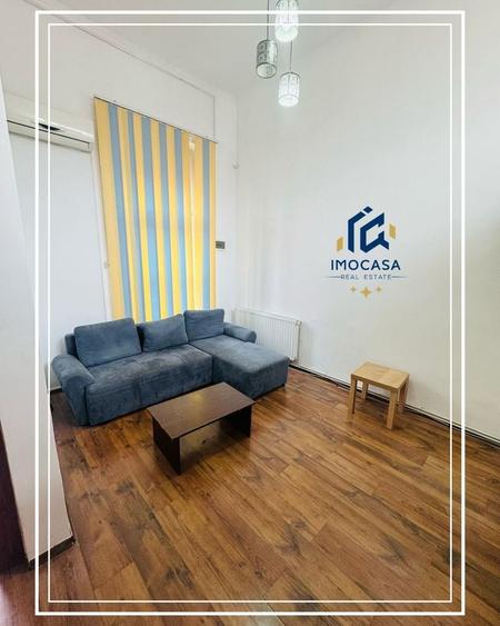Apartament cu 4 camere semidecomandat, mobilat în Central