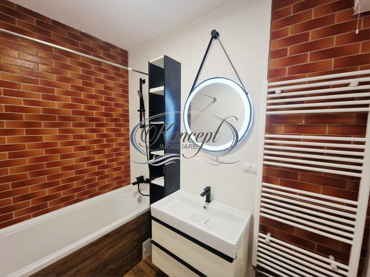 Apartament cu 3 camere semidecomandat, mobilat în Borhanci