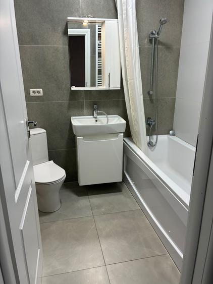 Apartament cu 2 camere decomandat în Trafic Greu