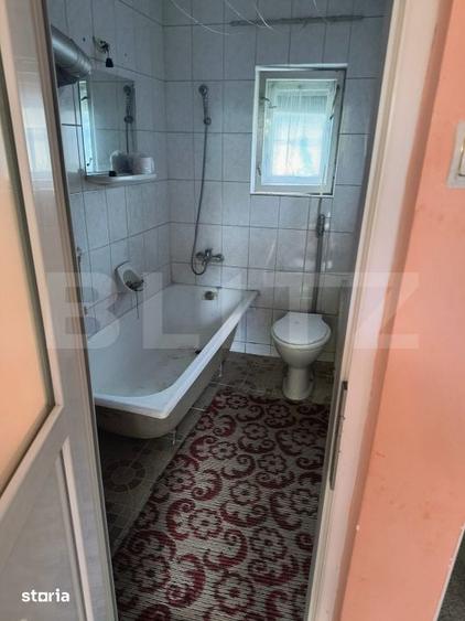 Casă cu 2 camere cu Teren 1400 Mp în Central