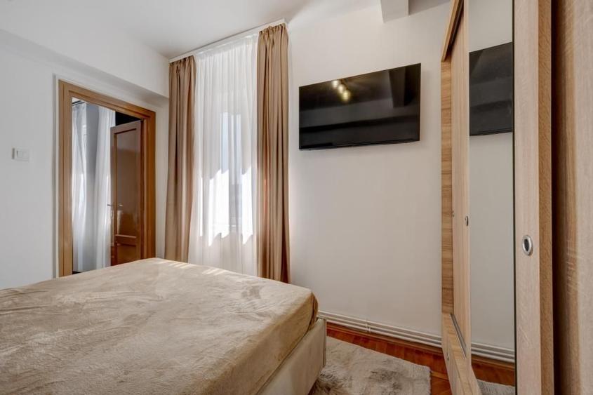 Unirii - Brătianu\ 2 camere \ etaj intermediar \centrala proprie - 4