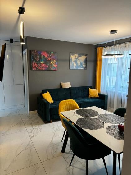 Apartament cu 2 camere semidecomandat, mobilat în P-ța Mihai Viteazul