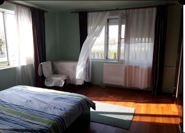 Casă cu 4 camere cu Teren 4200 Mp în Adunații-Copăceni