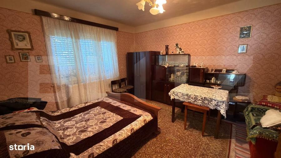 Casă cu 4 camere decomandat în Cărășeu