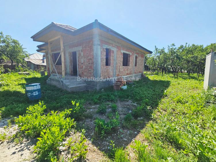 Casă la roșu cu 4 camere, 122 mp utili, teren 465 mp – Băicoi