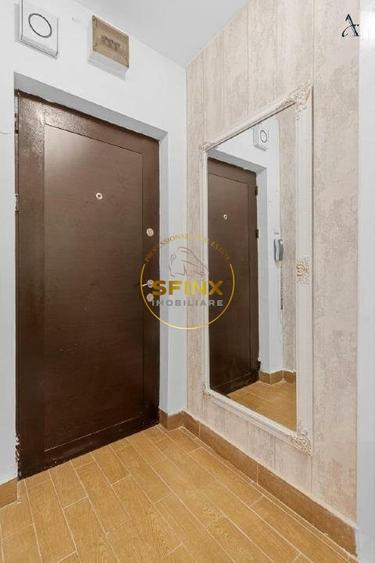 Apartament cu 3 camere semidecomandat, mobilat în P-ța Victoriei