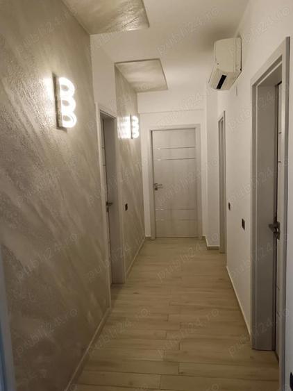 Inchiriez apartament 3 camere lux, Pitesti, zona centrala, prima inchiriere. Garaj - 12