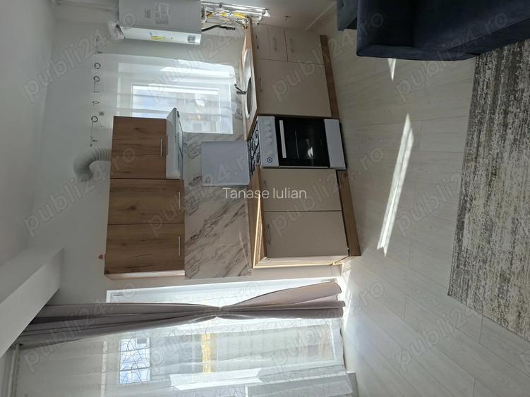 Inchiriez garsoniera tip studiou cu curte si parcare