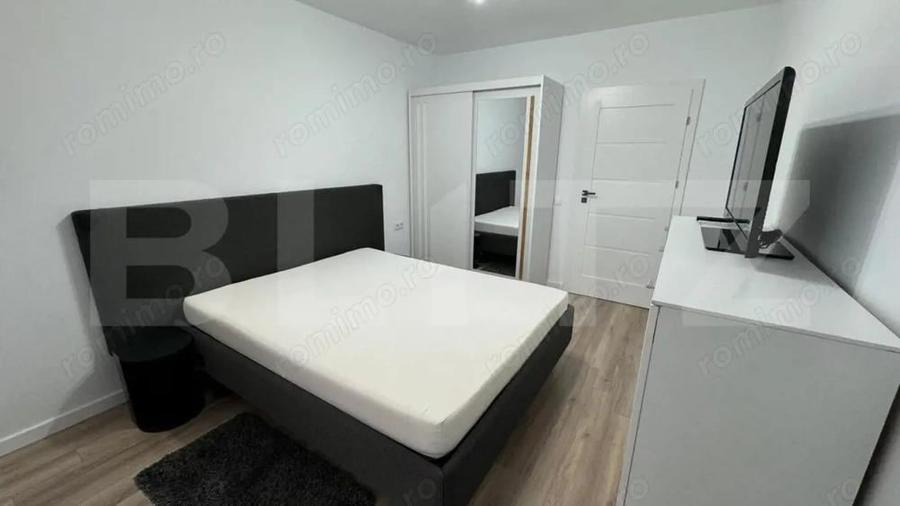 INCHIRIEZ APARTAMENT CU 2 CAMERE IN BLOC NOU - 6
