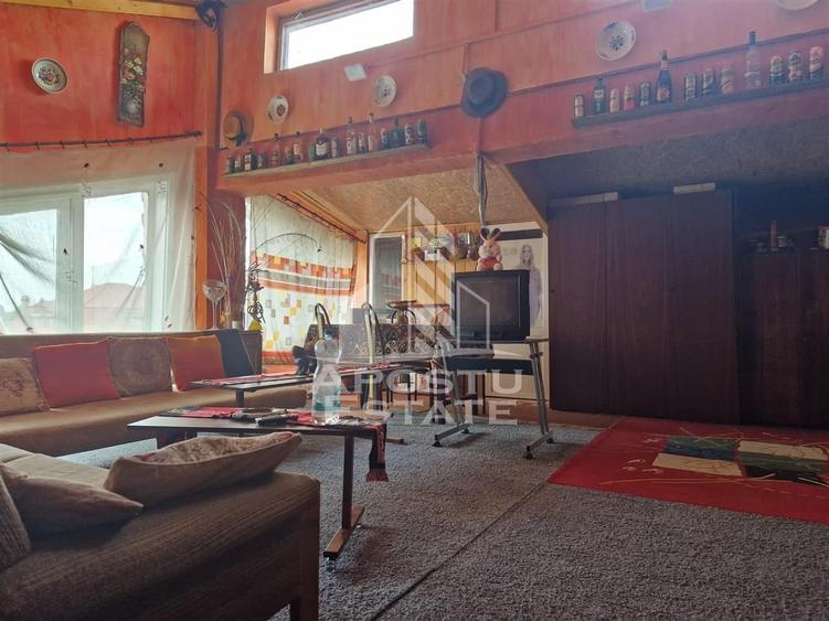 Casa familiala cu spatiu comercial si garaj P+1E+M 720 Mp - 47