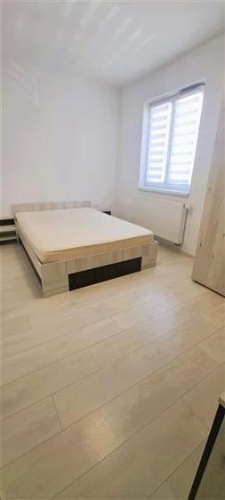 Apartament 2 camere, etaj 2, mobilat si utilat . Zona Tractorul - 9