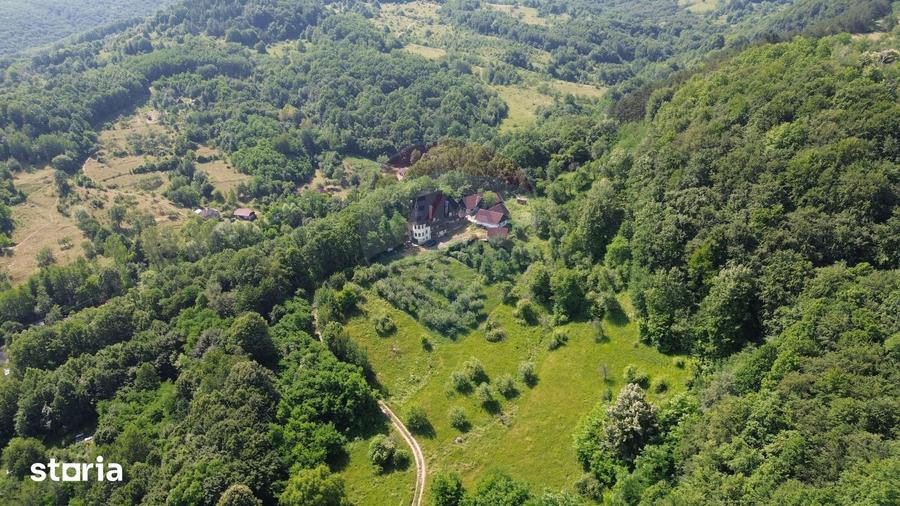 Casă cu Teren 24700 Mp în Copalnic