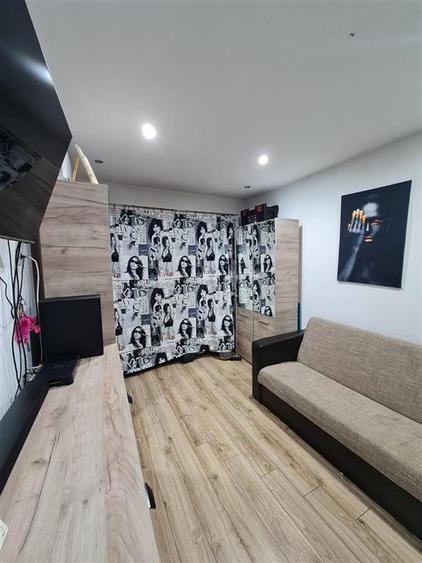 Garsoniera cu centrala la parter zona Buziasului - 3