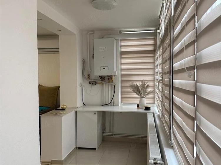 Apartament cu 2 camere semidecomandat, mobilat în Calea București