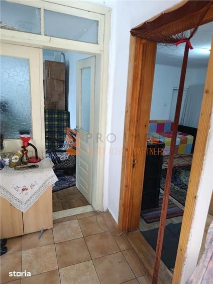 Casă cu 3 camere decomandat cu Teren 418 Mp în Central