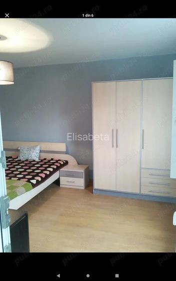 Inchiriez apartament.2 camere,decomandat