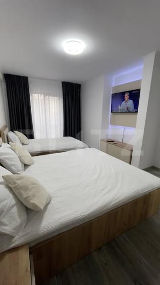 Apartament cu 3 camere semidecomandat, mobilat în Central
