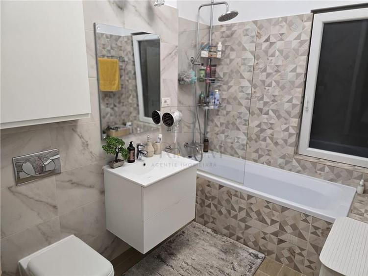 DUMBRAVITA - ETAJ 1 - LOC DE PARCARE - 3 camere - 2 bai - terasa - incalzire par - 13