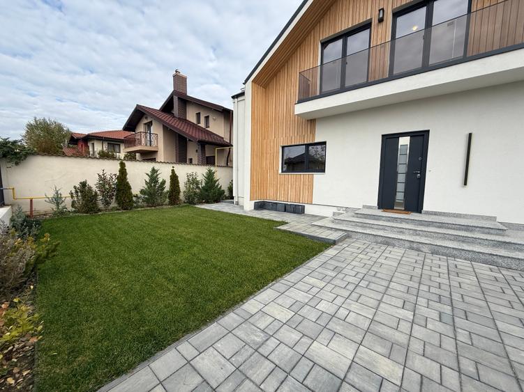 Vilă contemporană , finalizată în 2024, situată pe o stradă privată. - 21