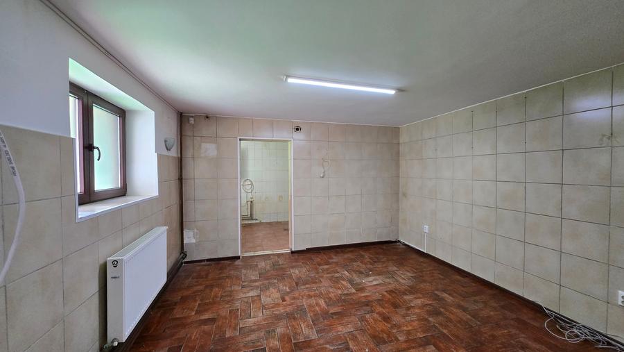 Strada Mircea cel Batran - Casa demisol (58mp)+parter (69mp) /teren 150 mp - 15