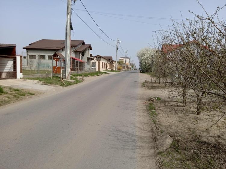 Teren 600m între case cu utilitati - 1