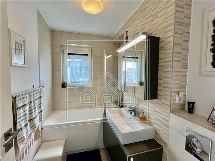 Apartament 3 cam. - 76 mp, balcon, parcare - Ansamblul Cibinium - 6