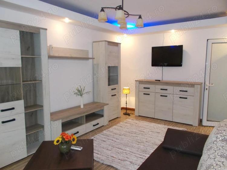 Inchiriere 2 cam. cf..1 dec., et.1 din 4, sup.49.mp. mobilat si utilat, Bld. Dorobantilor-Scolilor . - 3