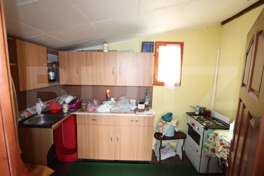 Casă individuală cu 2 camere cu Teren 360 Mp în Moroeni